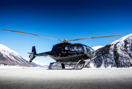 An executive helicopter on a alpine airport